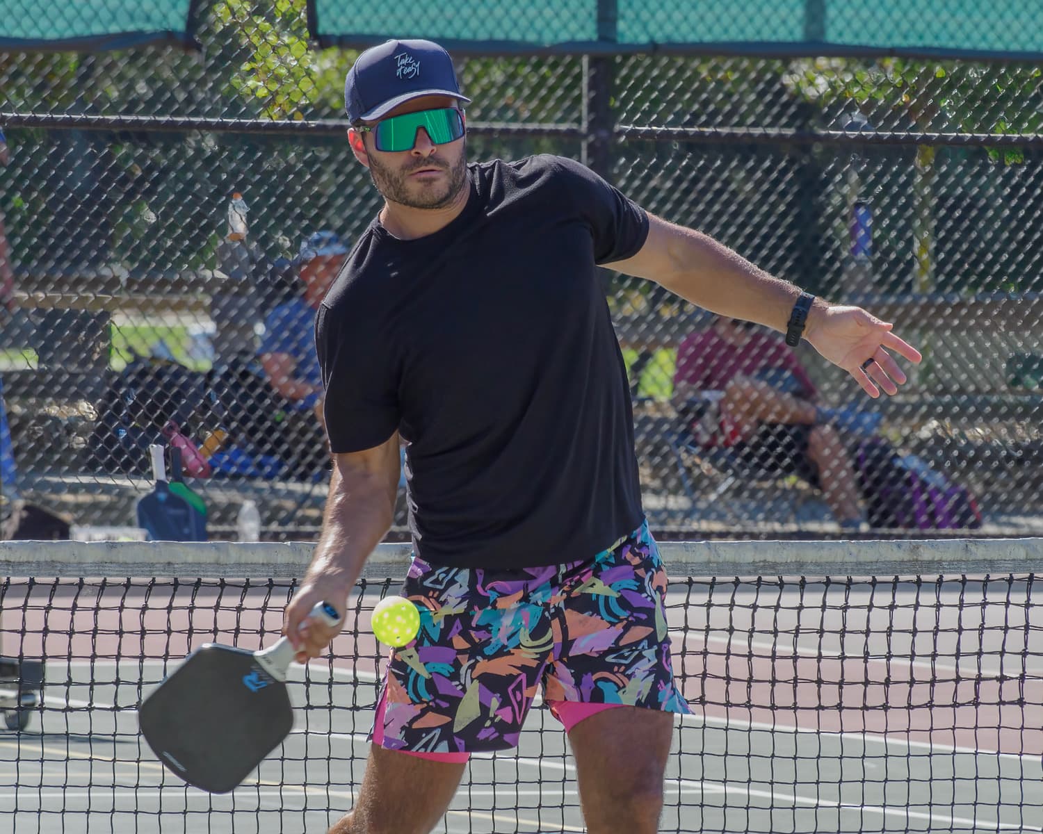 Gino Valencia reaching for a backhand